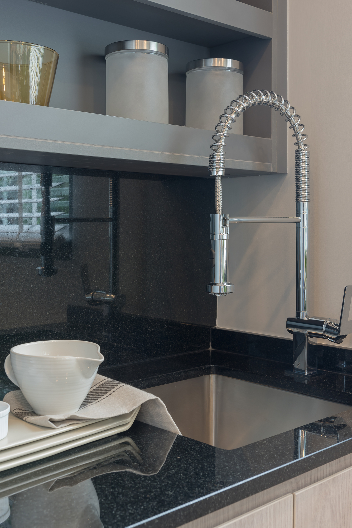 modern kitchen room with sink on top granite counter, interior design